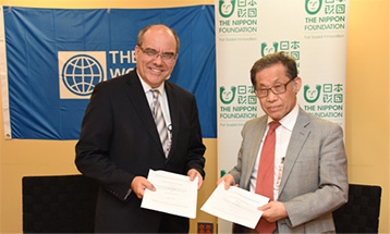 Photo of agreements signed by the World Bank and The Nippon Foundation to support job training and employment for persons with disabilities