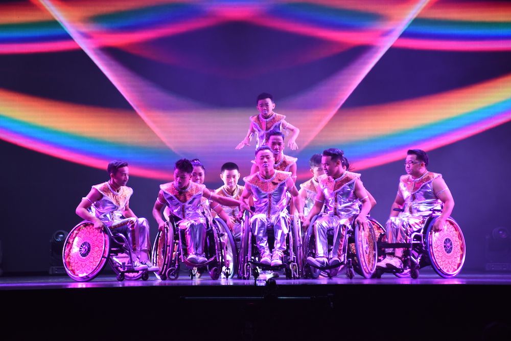Photo of A wheelchair dance team performing at the Asia Pacific Festival of Artists with Disabilities – True Colours, held in Singapore in March 2018