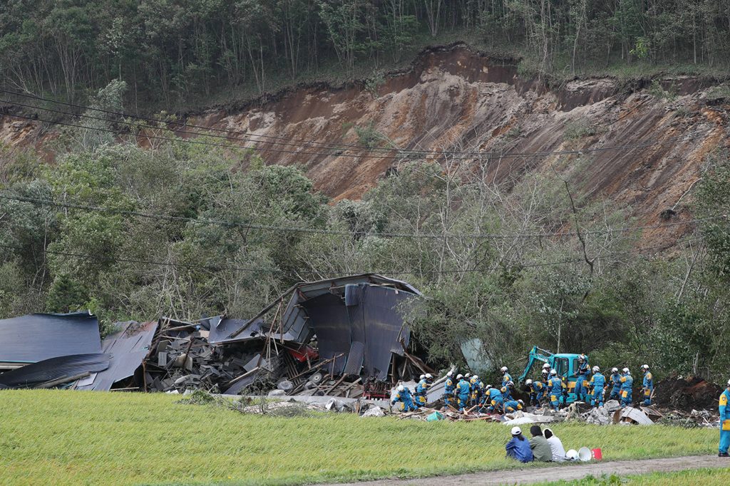 Photo of a building crushed by a landslide
