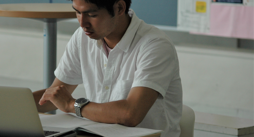 Photo of young men studying 