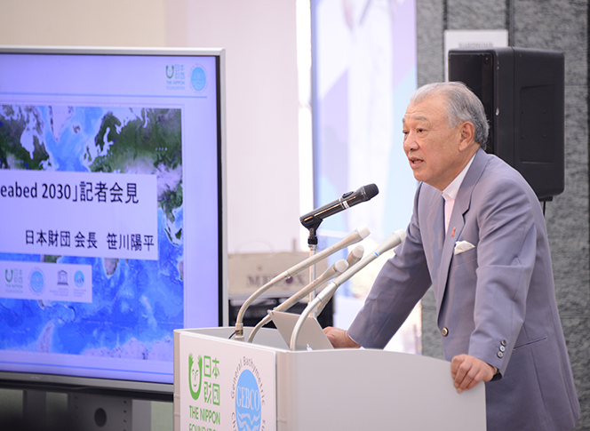 Photo of Chairman Yohei Sasakawa speaking at a press conference