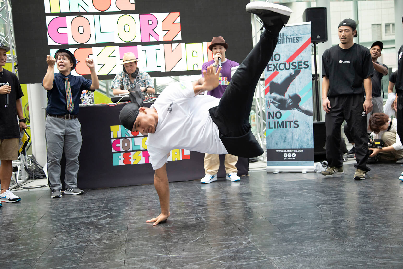 Photo of A break dancer demonstrating his skills at a True Colors DANCE event