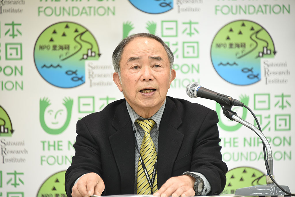 Photo of Osamu Matsuda, President of the Satoumi Research Institute , speaking at the press conference